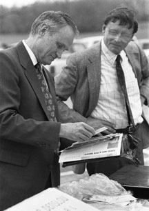 Black and white photograph of two men in suits