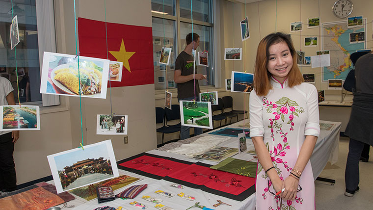 An international student represents her country and culture during the Tour de Globe event.